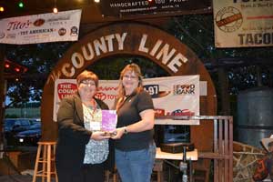 Carla presents award to Emily Wilkins